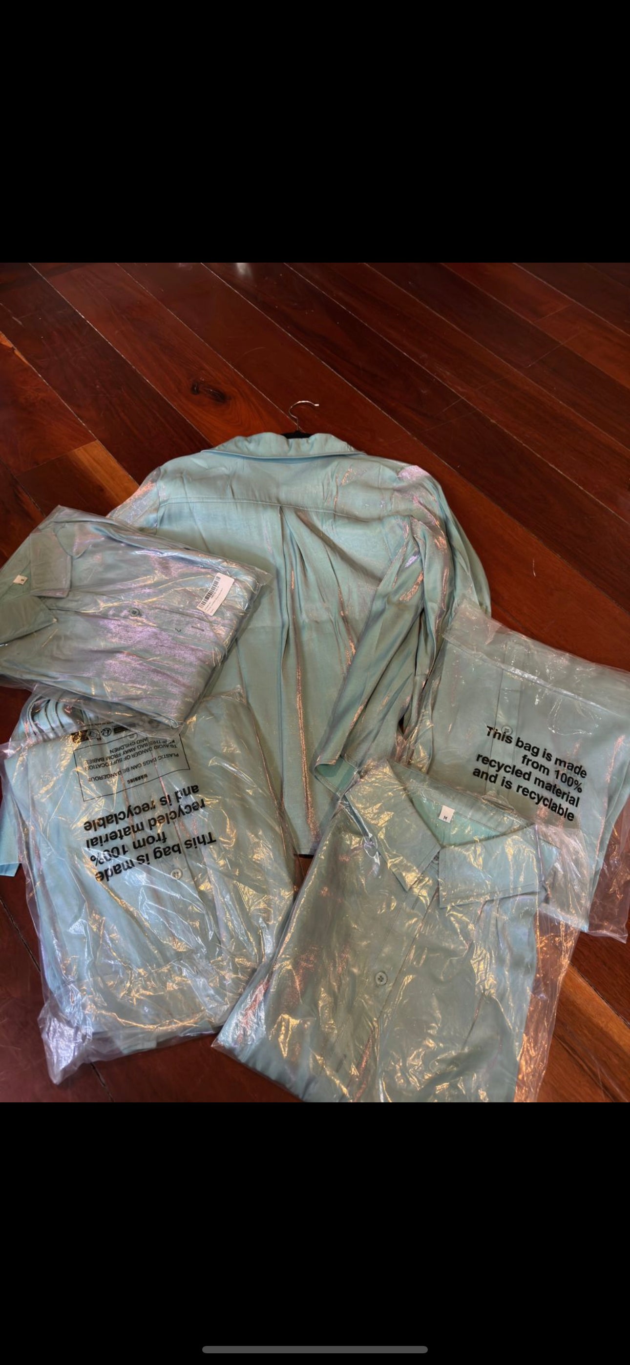 Camisa satinada azul