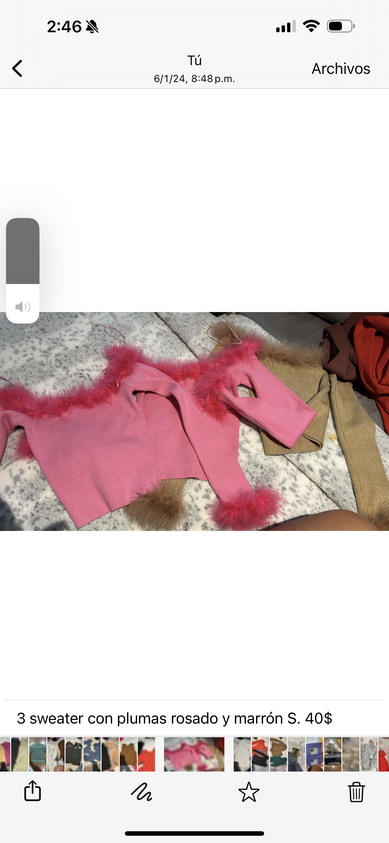 Sweater con plumas rosado y marrón S.
