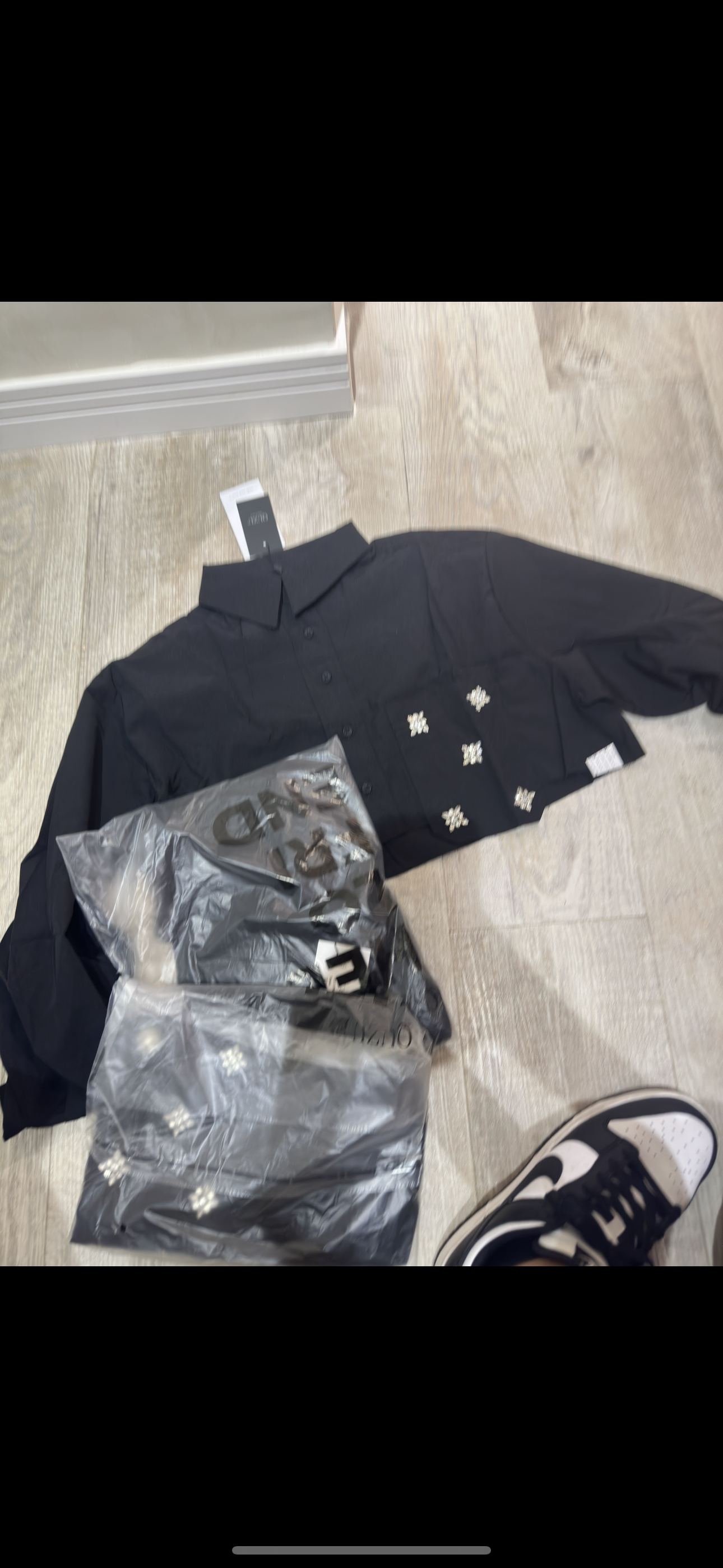 Camisas top negro con brillante