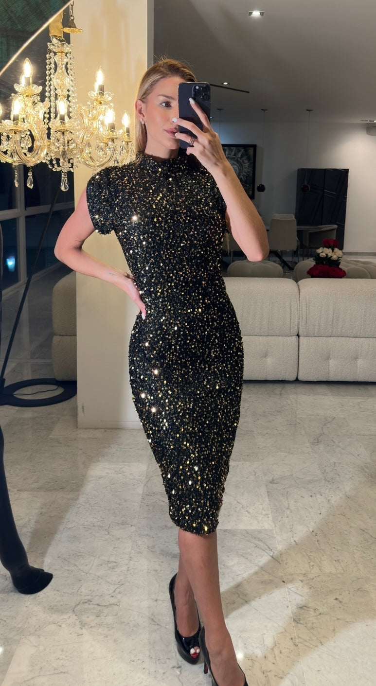 Vestido de lentejuelas negro con dorado