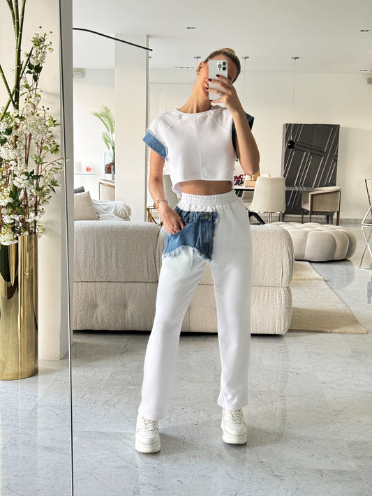 Set de pantalón y top blanco con jeans