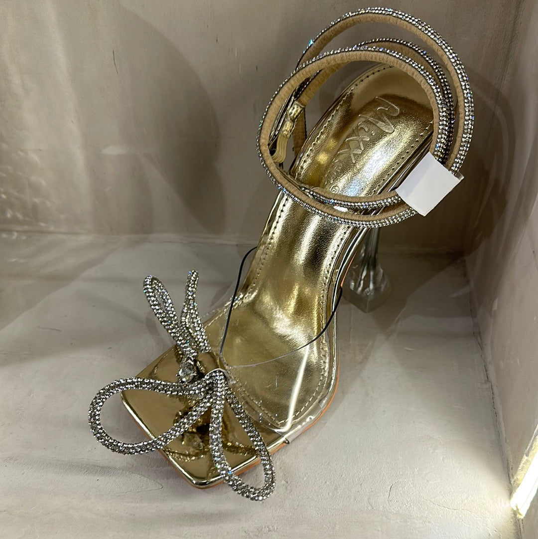 Tacones de lazo brillante