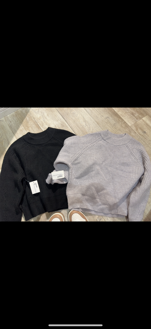 Sweater negro o lila