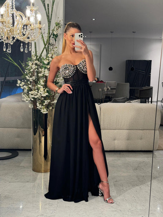 Maxi vestido negro de top con brillantes. Talla S.
