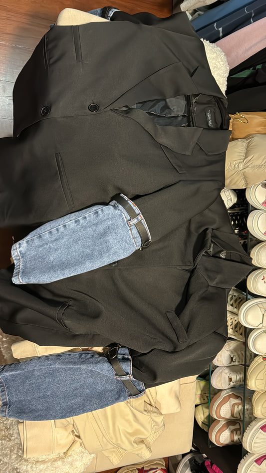 Blazer negro con mangas de jeans