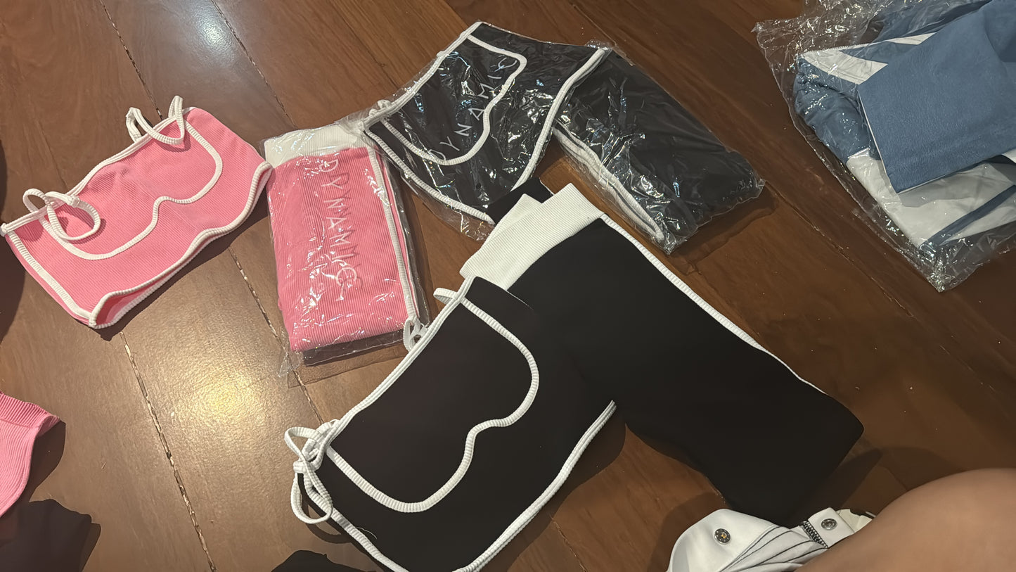 Set deportivo rosa, negro y azul talla única.