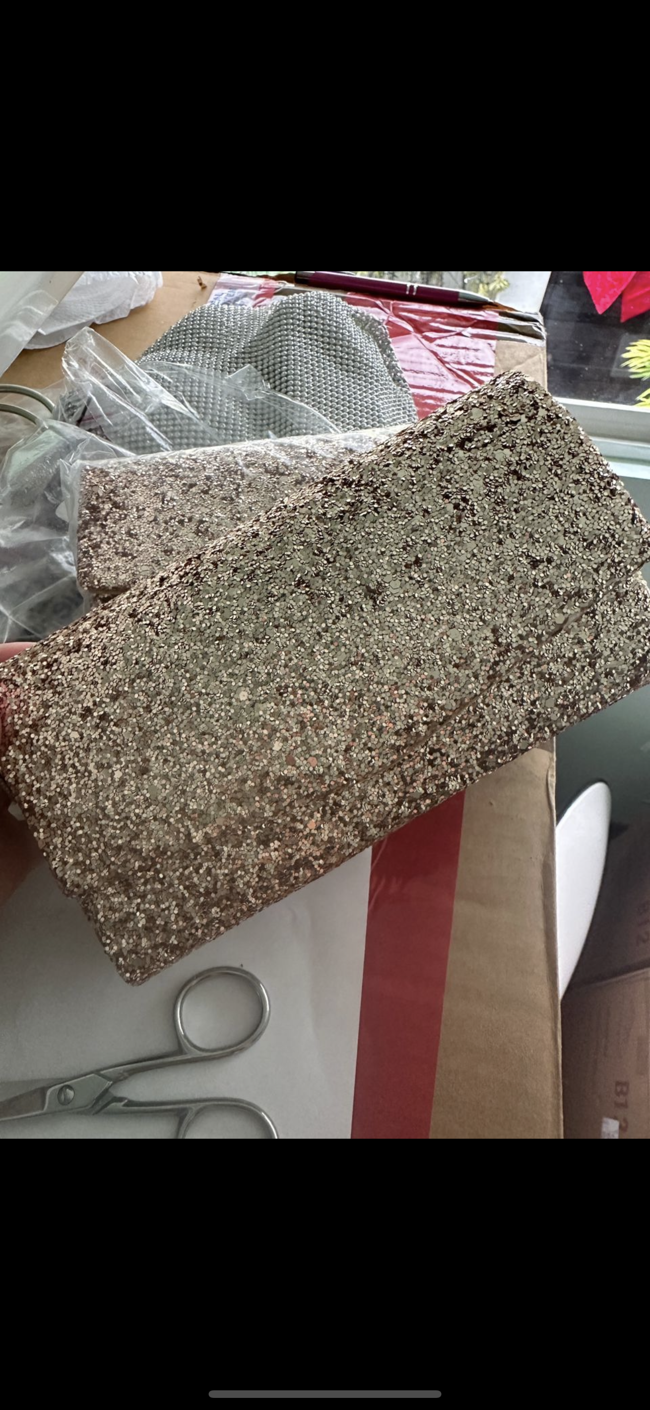 Clutch  dorada brillante