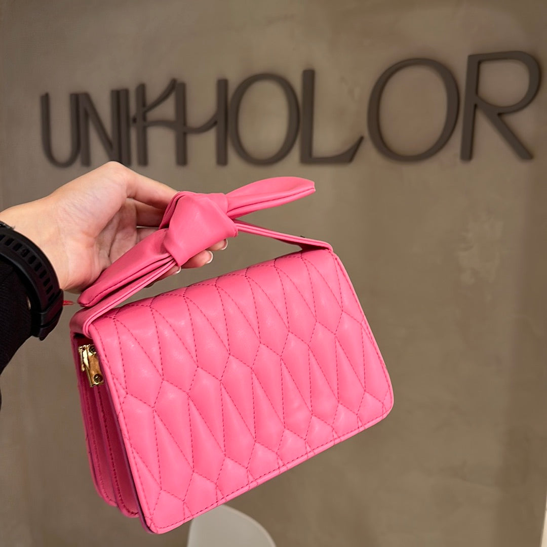 Cartera rosa de lazo