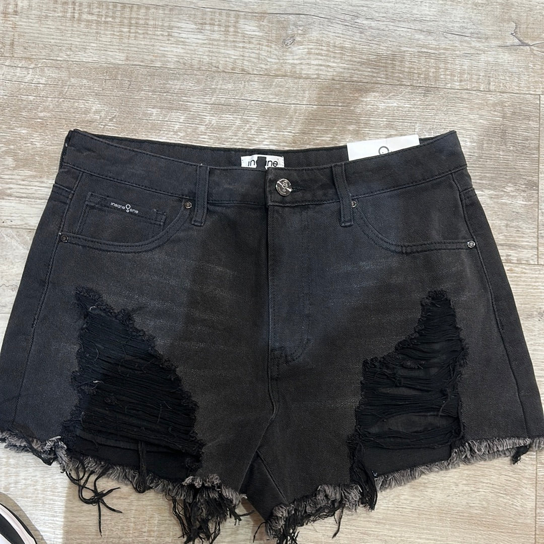 Short de jeans negro roto